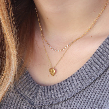 String of Hearts Necklace in Gold and Sterling Silver
